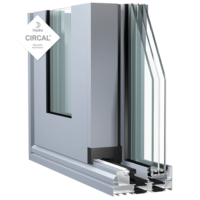 grijze aluminium schuifdeur hoekmodel met dubbel glas en isolatie voor een maximale lichtinval bij dit schuifsysteem